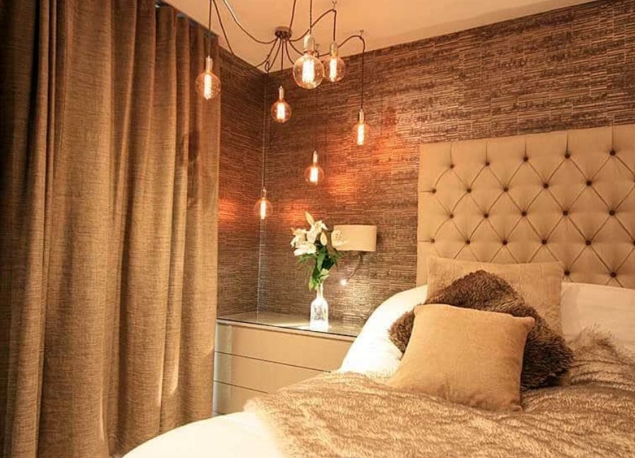 Luxury fitted bedroom with bespoke wardrobe storage