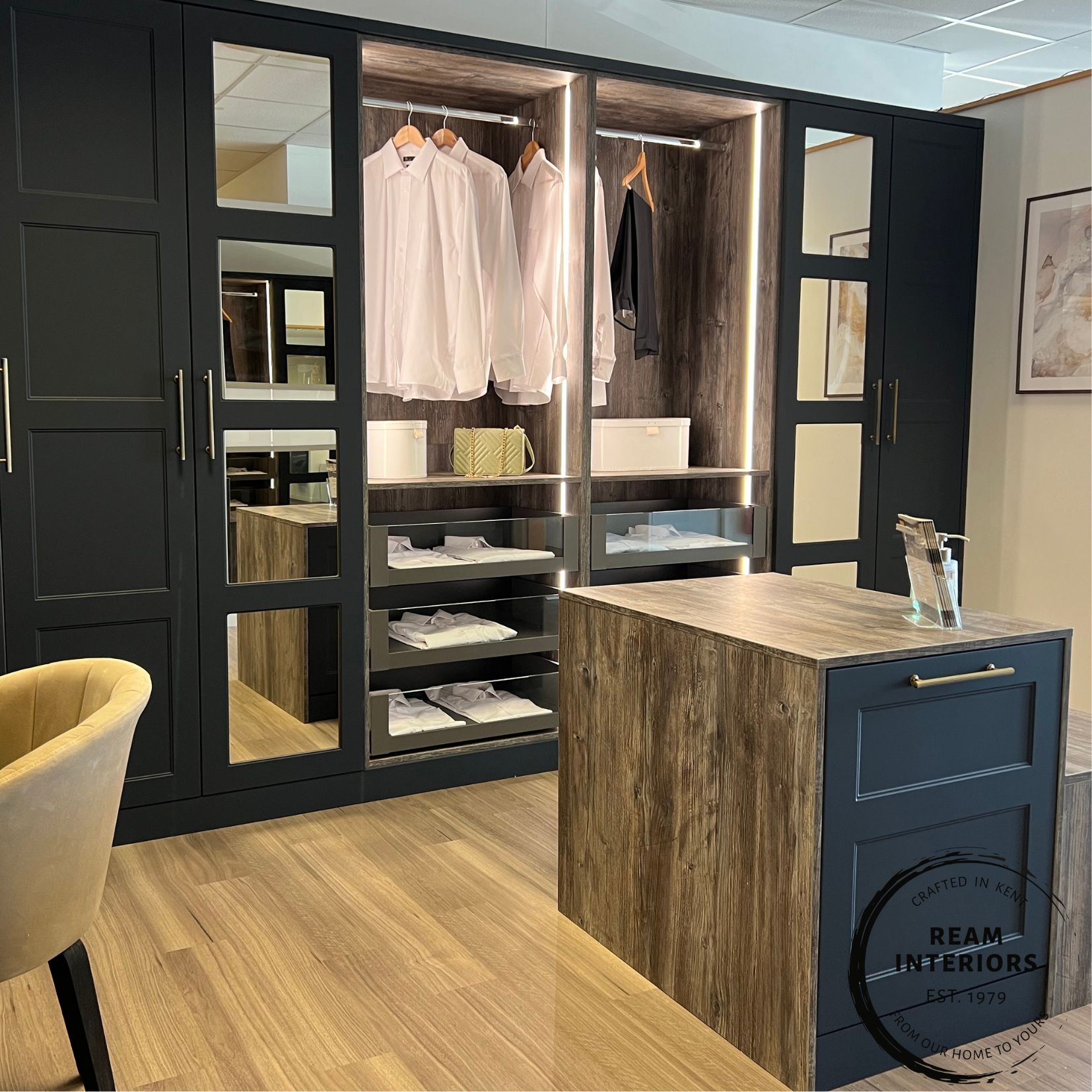 Bespoke walk-in wardrobe display at the Ream showroom in Gillingham